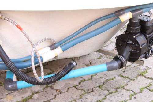 A fantastic Libra corner 6-jet spa bath jacuzzi with a Speck Pump Aqua-1000 pump motor