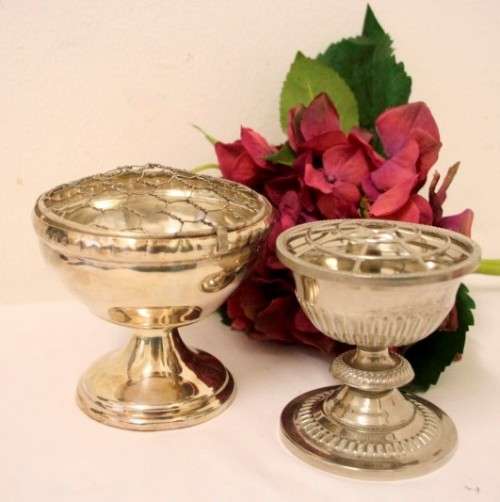 Two stunning vintage silver plated flower frogs with mesh lids