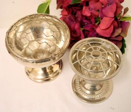 Two stunning vintage silver plated flower frogs with mesh lids
