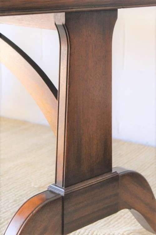 A beautiful vintage Regency styled ladies embossed leather-top 3-drawer writing desk on castors