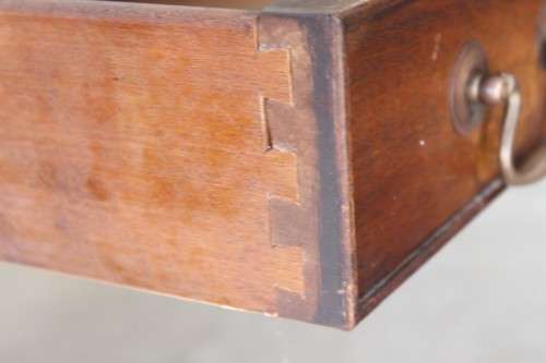 A beautiful vintage Regency styled ladies embossed leather-top 3-drawer writing desk on castors
