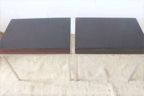 A fabulous pair of modern styled chromed-framed coffee tables with a broad wood profiles