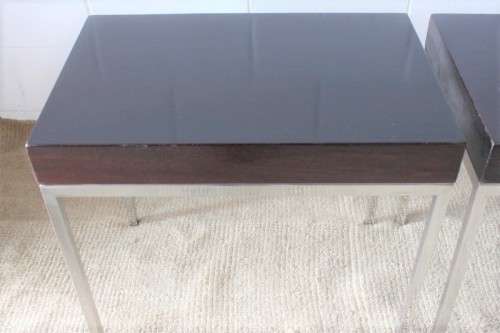 A fabulous pair of modern styled chromed-framed coffee tables with a broad wood profiles