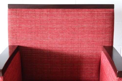 An awesome & stylish mid-century styled red-upholstered club armchair w/ mahogany armrests