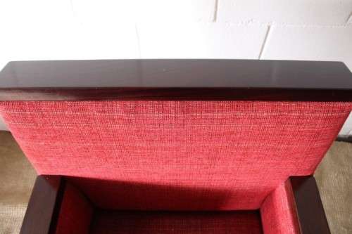 An awesome & stylish mid-century styled red-upholstered club armchair w/ mahogany armrests