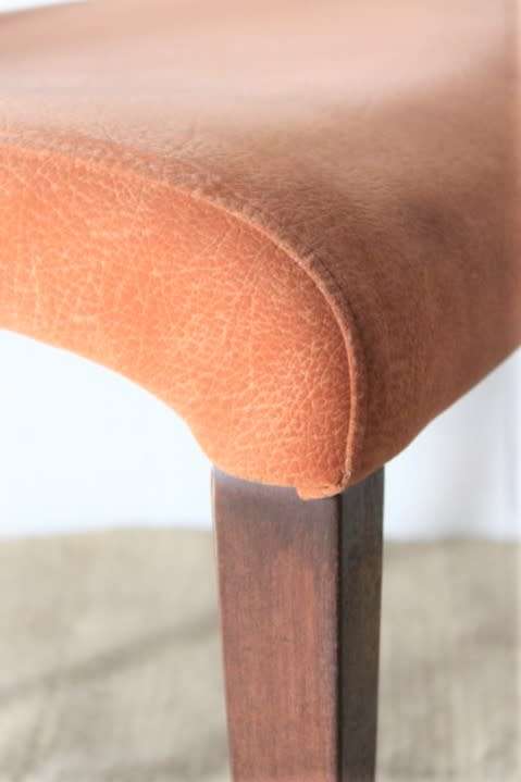 **RS17** A modern styled "textured" fabric burnt-orange colour upholstered occasional dining chair
