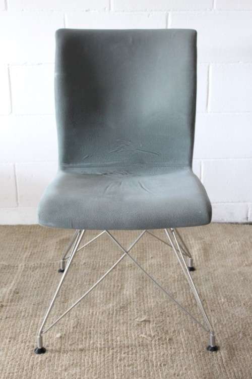 **RS17** A stylish and modern "shaped" upholstered restaurant style dining chair - bid per chair