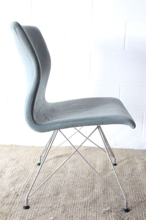 **RS17** A stylish and modern "shaped" upholstered restaurant style dining chair - bid per chair