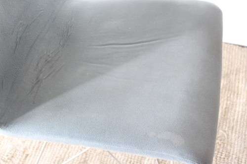 **RS17** A stylish and modern "shaped" upholstered restaurant style dining chair - bid per chair