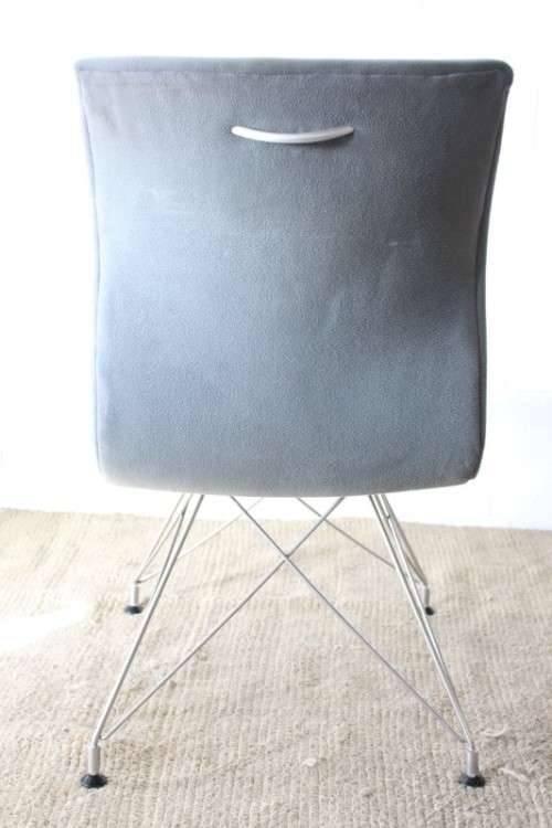 **RS17** A stylish and modern "shaped" upholstered restaurant style dining chair - bid per chair