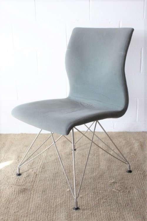 **RS17** A stylish and modern "shaped" upholstered restaurant style dining chair - bid per chair