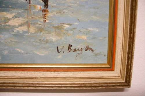 A beautiful framed original signed oil painting of a town scene.