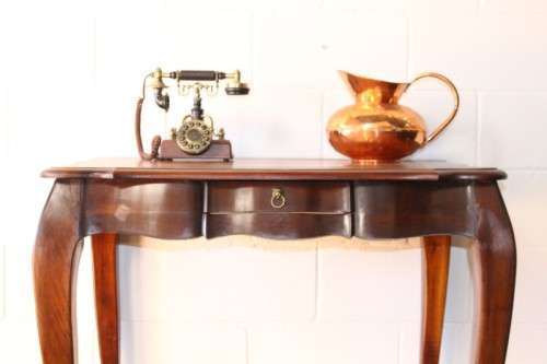 A beautiful tall (91cm) antique solid stink-wood & yellow-wood ball and claw hall table w/ a drawer
