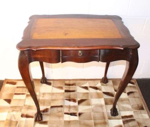 A beautiful tall (91cm) antique solid stink-wood & yellow-wood ball and claw hall table w/ a drawer