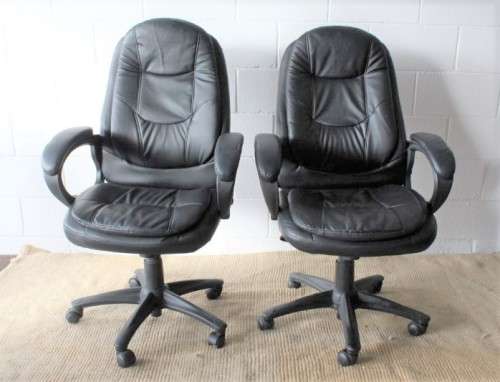Stunning well made black PU leather executives office chair w/ padded seat & backrest - price/ chair