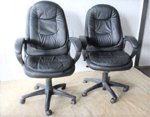 Stunning well made black PU leather executives office chair w/ padded seat & backrest - price/ chair