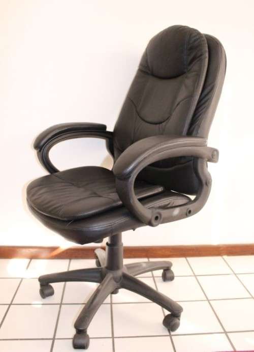 Stunning well made black PU leather executives office chair w/ padded seat & backrest - price/ chair