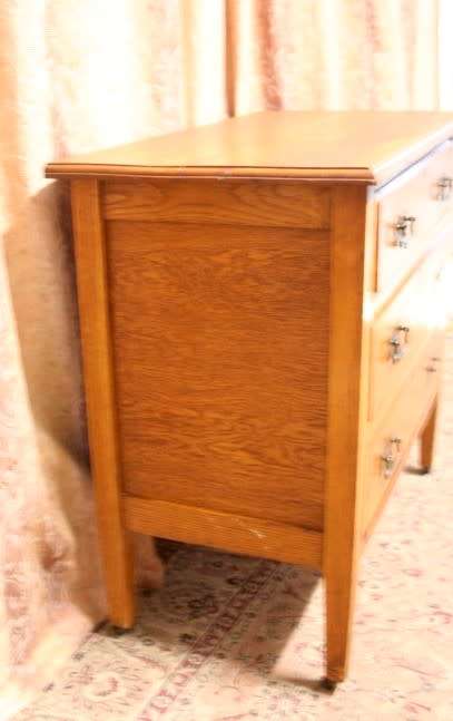 An awesome vintage solid oak 3-drawer chest of drawers on original castors & lovely metal handles.