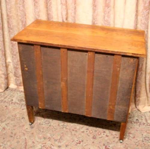 An awesome vintage solid oak 3-drawer chest of drawers on original castors & lovely metal handles.