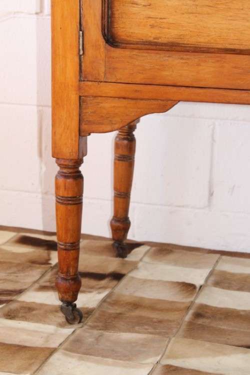 A wonderful vintage solid Oak double door wash stand with a white marble top on castors - stunning!