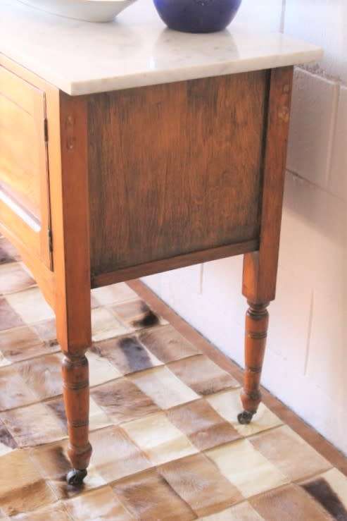 A wonderful vintage solid Oak double door wash stand with a white marble top on castors - stunning!