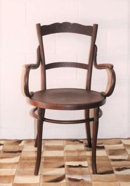 An incredible rare antique Edwardian solid oak bentwood armchair/ carver chair with pressed pattern