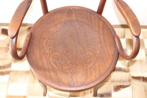 An incredible rare antique Edwardian solid oak bentwood armchair/ carver chair with pressed pattern