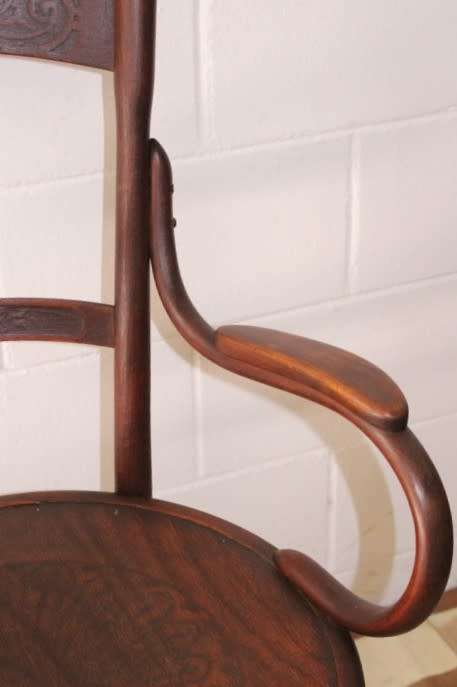 An incredible rare antique Edwardian solid oak bentwood armchair/ carver chair with pressed pattern