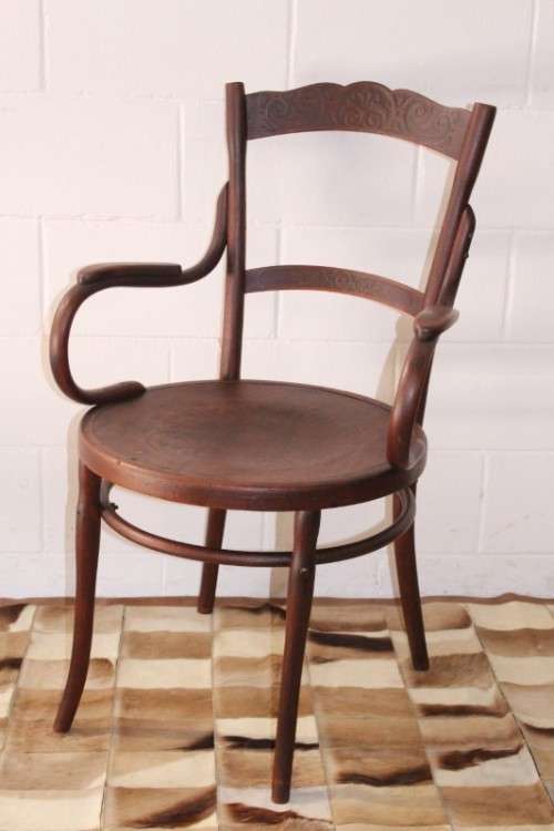 An incredible rare antique Edwardian solid oak bentwood armchair/ carver chair with pressed pattern