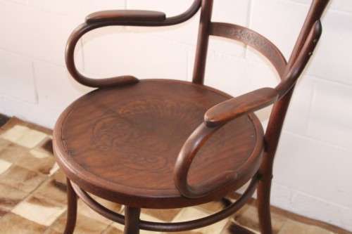 An incredible rare antique Edwardian solid oak bentwood armchair/ carver chair with pressed pattern