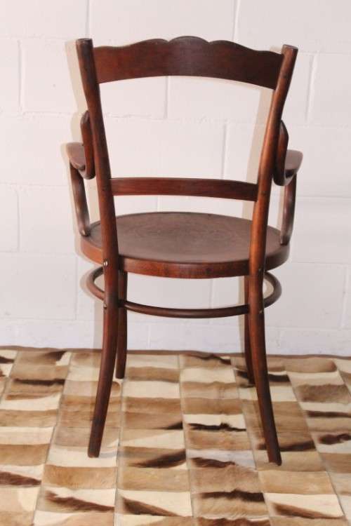 An incredible rare antique Edwardian solid oak bentwood armchair/ carver chair with pressed pattern