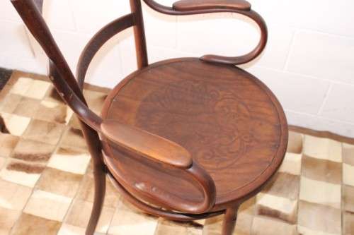 An incredible rare antique Edwardian solid oak bentwood armchair/ carver chair with pressed pattern