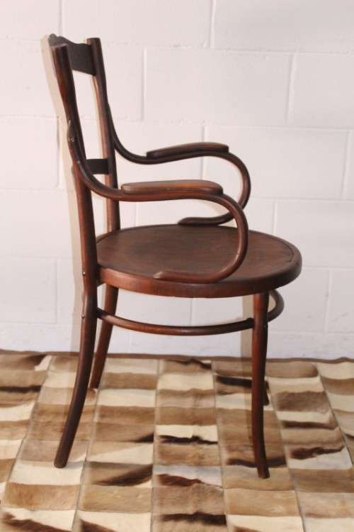 An incredible rare antique Edwardian solid oak bentwood armchair/ carver chair with pressed pattern