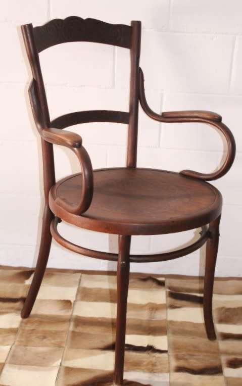 An incredible rare antique Edwardian solid oak bentwood armchair/ carver chair with pressed pattern