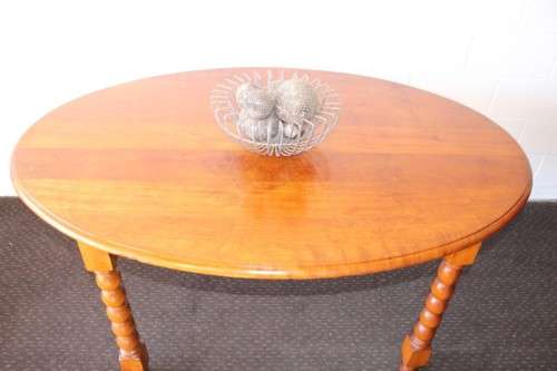 An exquisite antique Edwardian solid English honeyed oak bobbin-leg 6-seater dining table