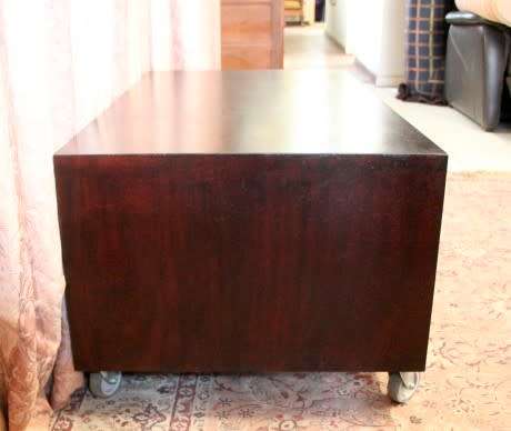A stunning stylish wooden TV stand on wheels with place for your entertainment centre