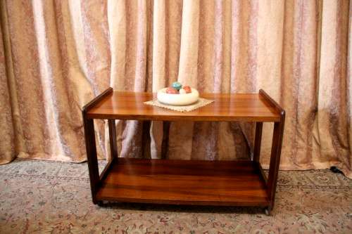 A lovely stylish Teak all purpose TV stand/occasional table on wheels.