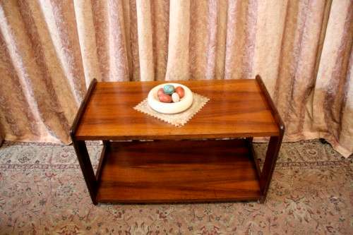 A lovely stylish Teak all purpose TV stand/occasional table on wheels.