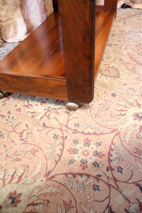 A lovely stylish Teak all purpose TV stand/occasional table on wheels.