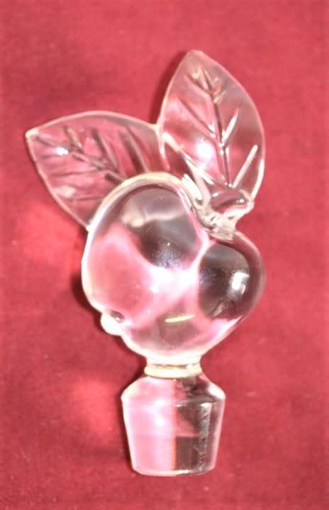 A beautifully made hand-created crystal decanter/ bottle stopper in the shape of an apple