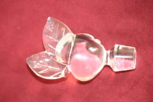 A beautifully made hand-created crystal decanter/ bottle stopper in the shape of an apple