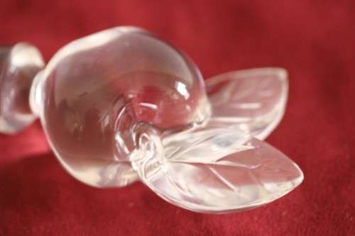 A beautifully made hand-created crystal decanter/ bottle stopper in the shape of an apple