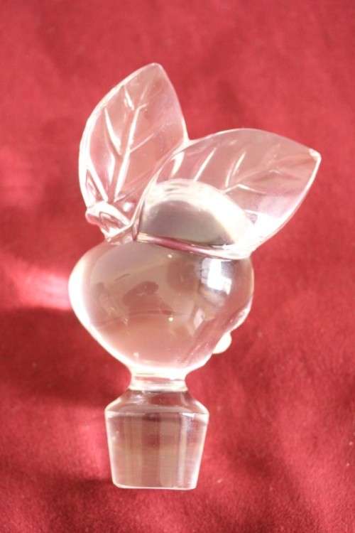 A beautifully made hand-created crystal decanter/ bottle stopper in the shape of an apple