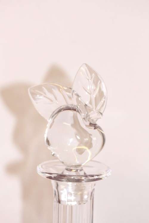 A beautifully made hand-created crystal decanter/ bottle stopper in the shape of an apple