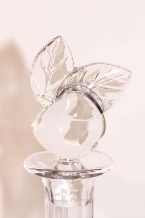A beautifully made hand-created crystal decanter/ bottle stopper in the shape of an apple