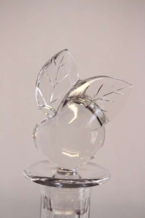 A beautifully made hand-created crystal decanter/ bottle stopper in the shape of an apple
