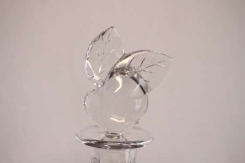 A beautifully made hand-created crystal decanter/ bottle stopper in the shape of an apple