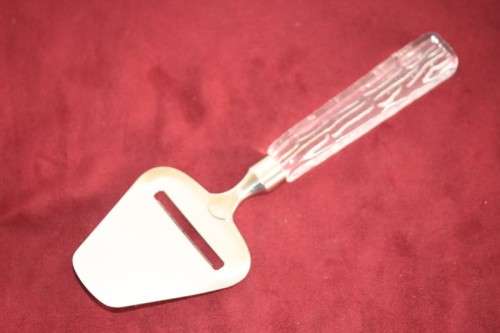 A stunning and rare vintage Swedish made Lindshammar Glass cheese knife with a steel blade