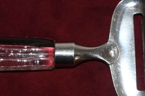 A stunning and rare vintage Swedish made Lindshammar Glass cheese knife with a steel blade