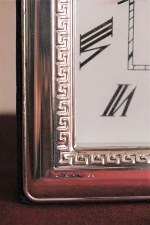 A stunning ornately detailed sterling silver framed "Florence" free-standing quartz alarm clock